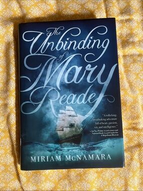 The Unbinding of Mary Reade by Miriam McNamara - Teal & Navy Hardcover